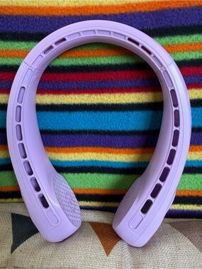 Around the neck, playlist, electric fan and beautiful pink color. New in box.
